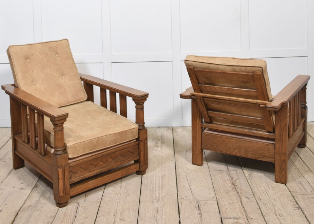 Pair of oak reclining armchairs View XI
