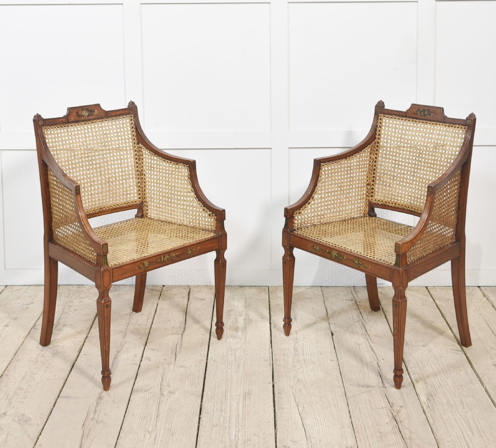Pair of Sheraton revival satinwood and bergere armchairs View X