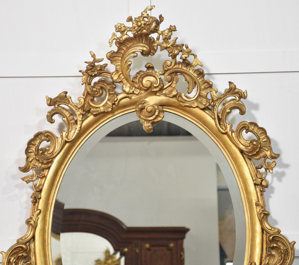Carved gilt-wood oval wall mirror View III