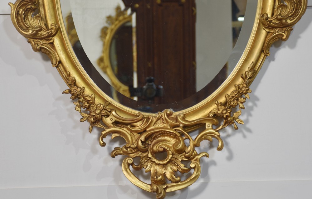 Carved gilt-wood oval wall mirror View IV