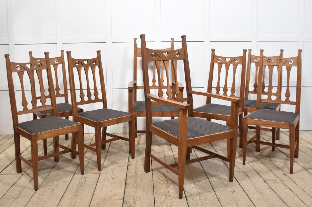 Set of eight oak Arts and Crafts dining chairs