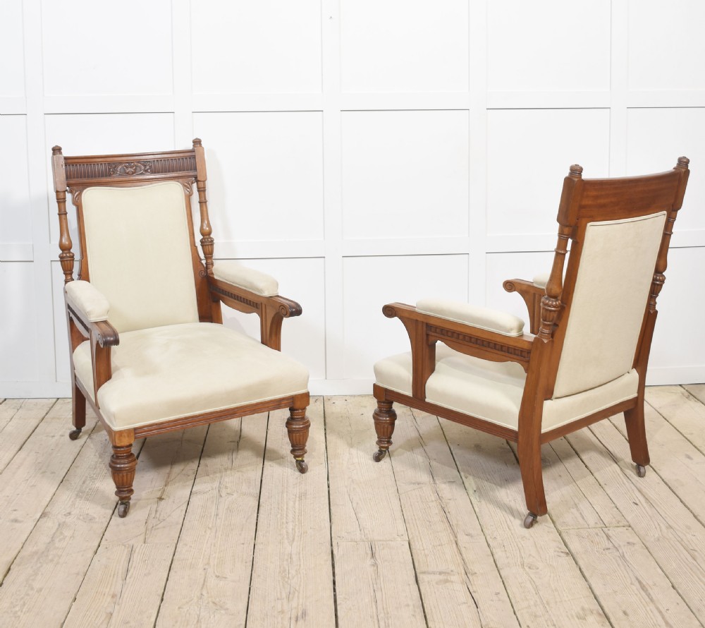 Pair of walnut upholstered library armchairs View V