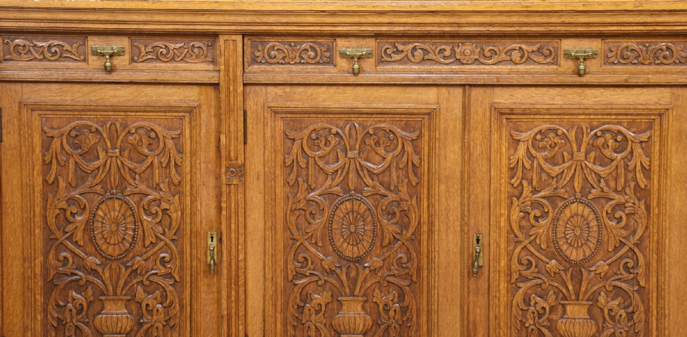 Large carved oak bookcase View IV