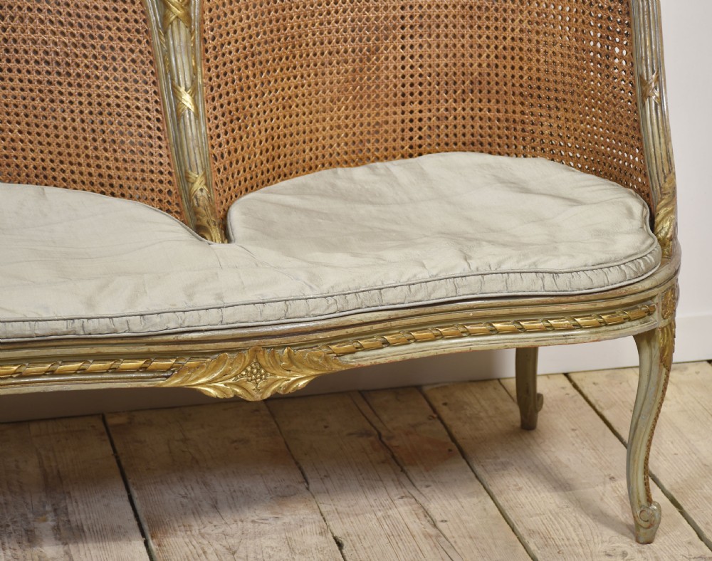 Painted and parcel gilt caned canape settee View VI