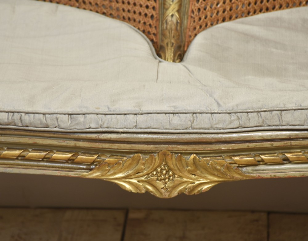 Painted and parcel gilt caned canape settee View VII