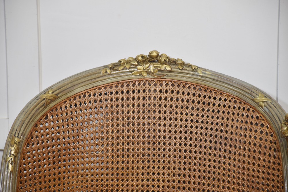 Painted and parcel gilt caned canape settee View VIII