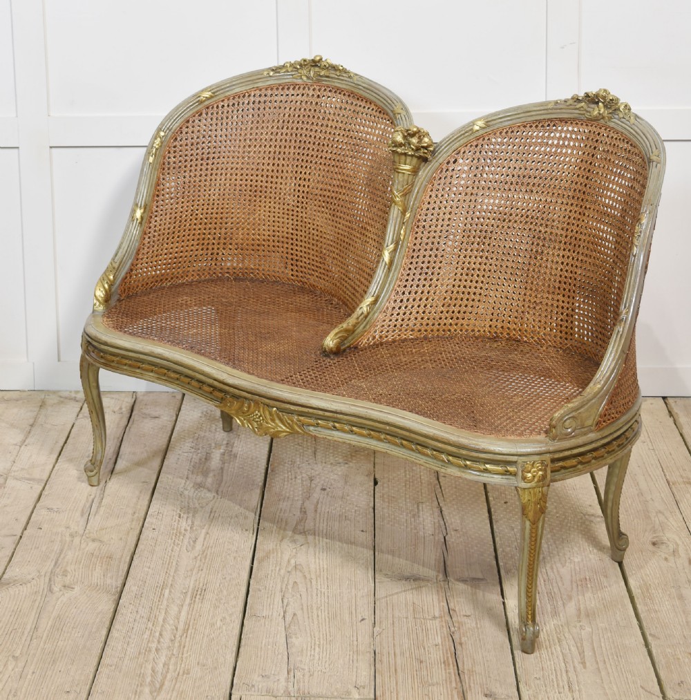 Painted and parcel gilt caned canape settee View XII