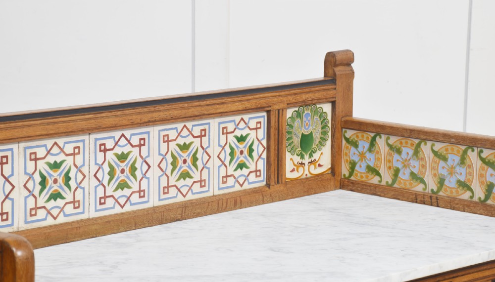 A pair of Aesthetic Movement bedroom tables comprising a marble-top tiled-back washstand and a matching dressing table with tilting mirror. View VII