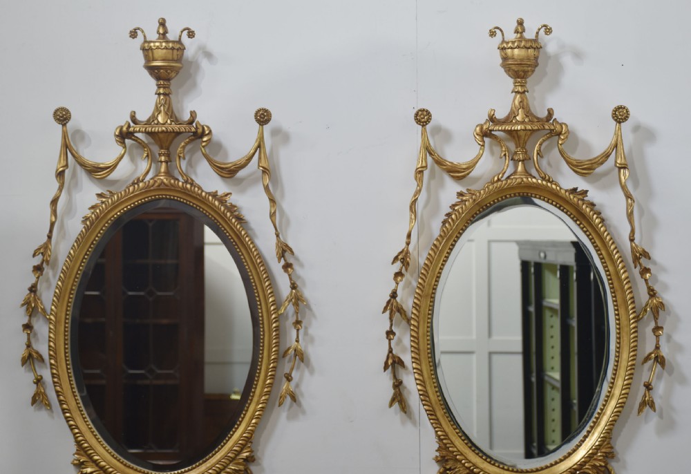  Pair of Adam style carved giltwood oval wall mirrors View VIII