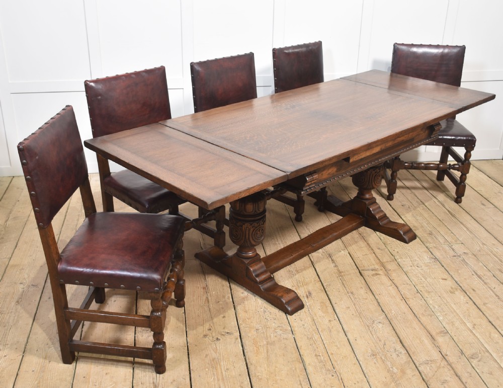 Eight leather upholstered oak dining chairs View II