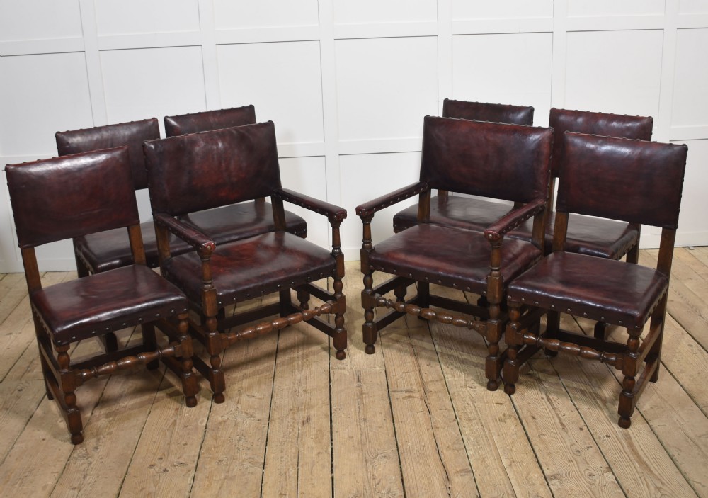 Eight leather upholstered oak dining chairs View IV