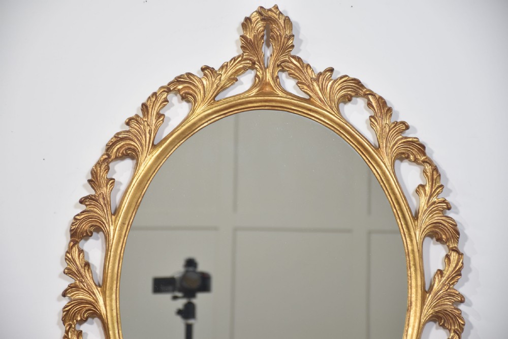 Giltwood oval wall mirror View III