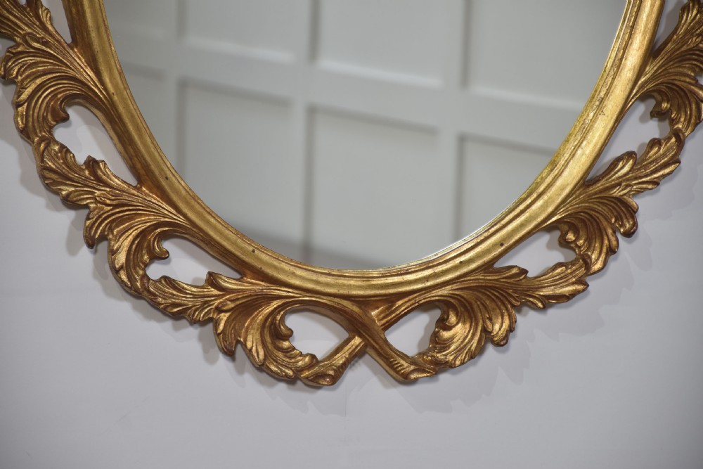 Giltwood oval wall mirror View VI