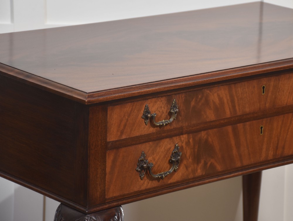 A polished mahogany cutlery chest table featuring two drawers with brass handles, raised on carved cabriole legs with ball and claw feet. View VIII