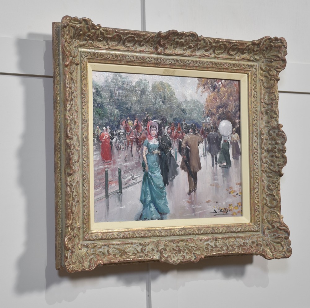 An oil painting depicting a street scene with figures in 19th-century clothing set within a carved gold gilt frame. View VI