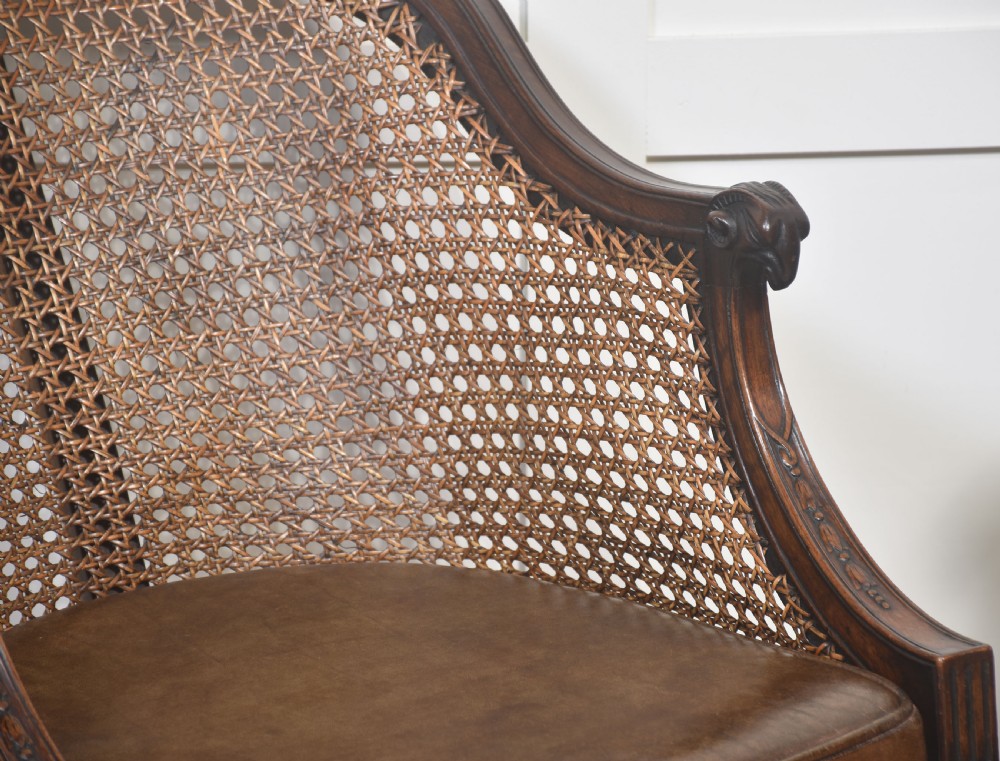 Pair Of Carved Mahogany And Cane Library Chairs View II