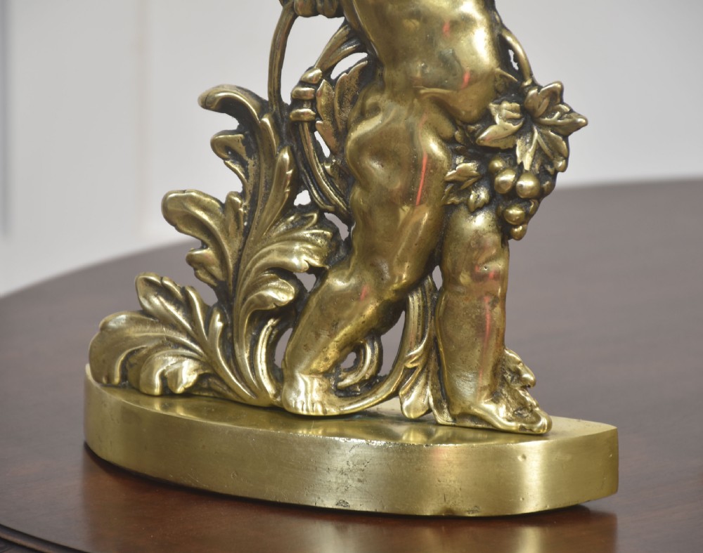 Pair of Brass Putti Door Stops View III