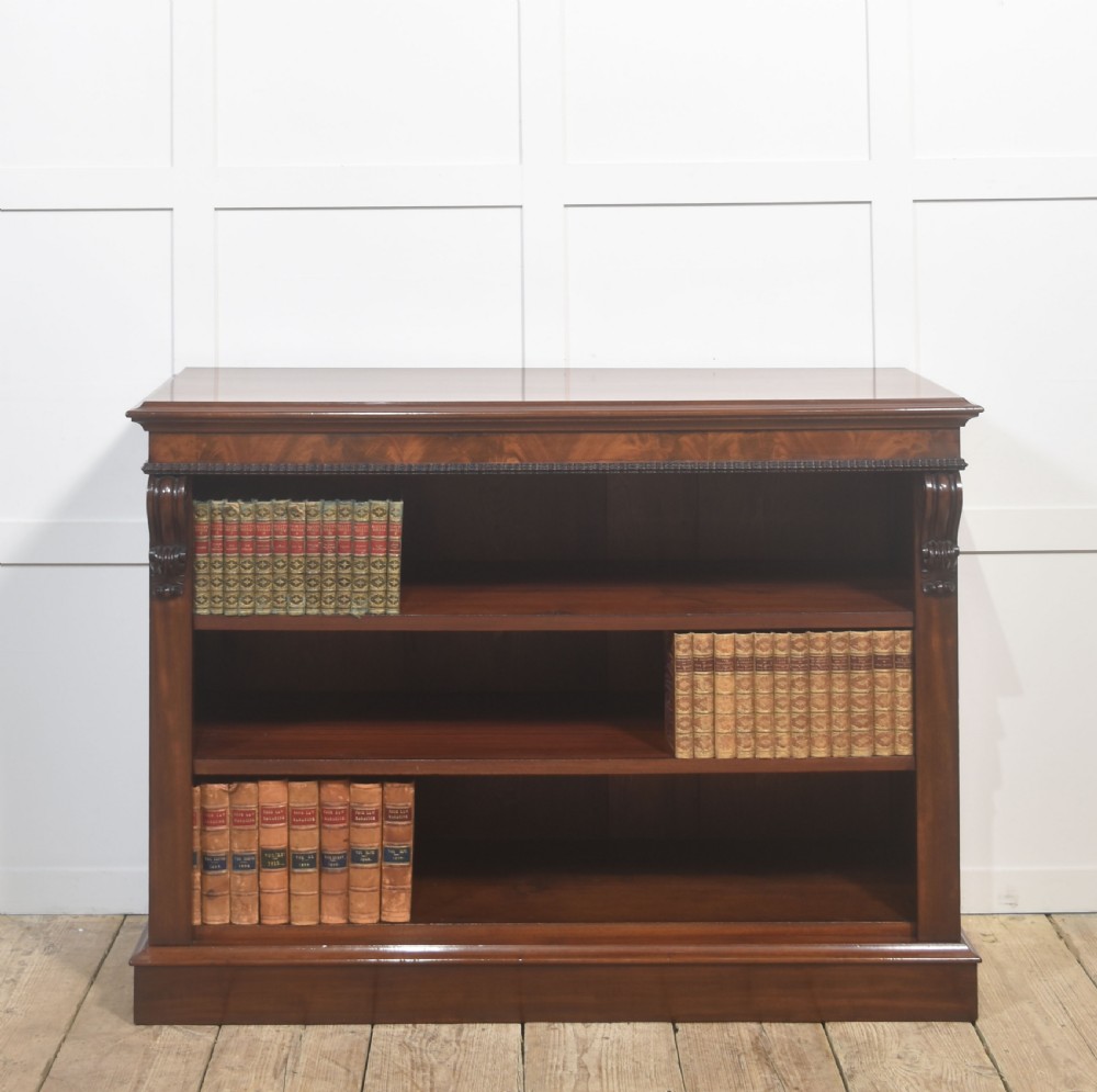 Carved mahogany open bookcase