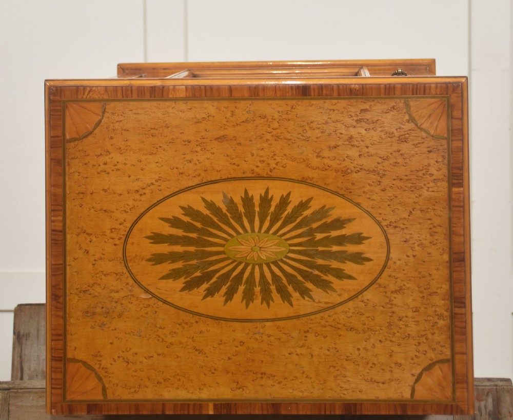 A pair of golden satinwood Neo-Classical Revival bedside cabinets featuring oval marquetry panels depicting classical figures playing instruments. View VIII