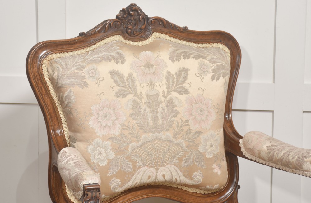 Pair of French Louis XV Style Carved Walnut Armchairs View II