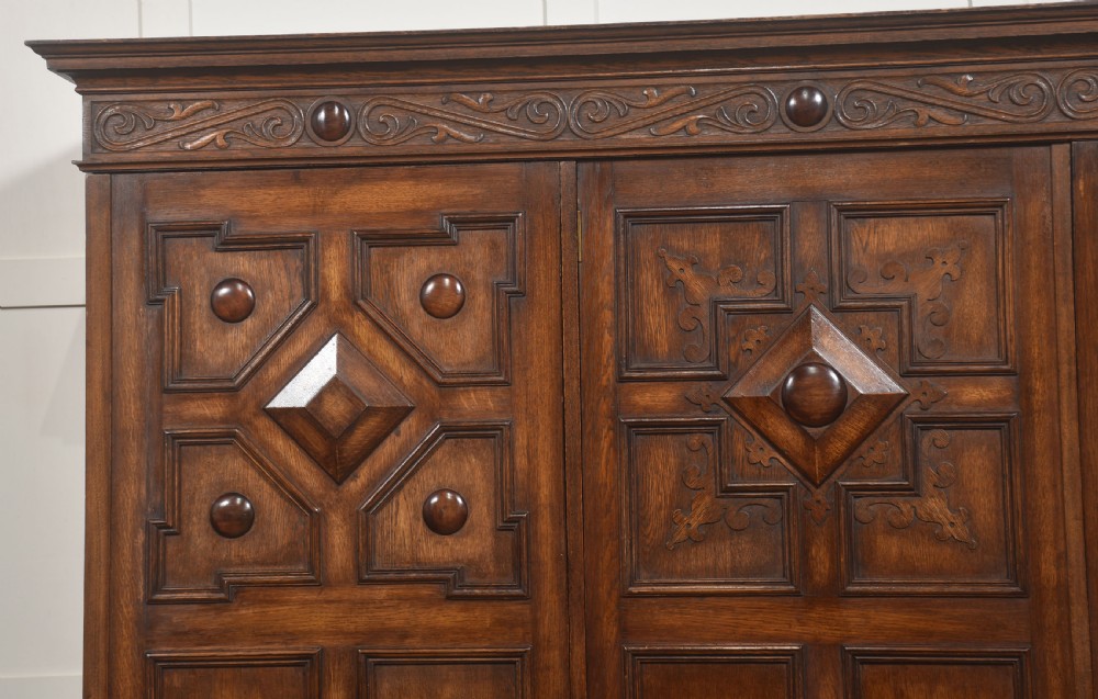 Jacobean Revival Carved Oak Triple-Door Wardrobe View II