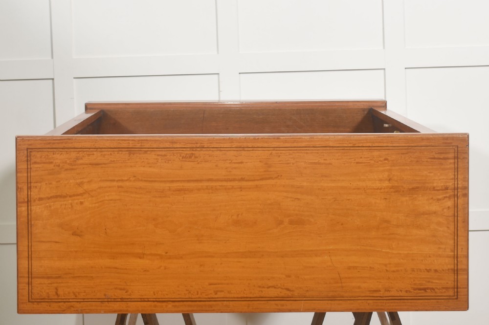 A low satinwood open bookcase featuring three shelves and a decorative inlaid floral frieze across the top. View XIV