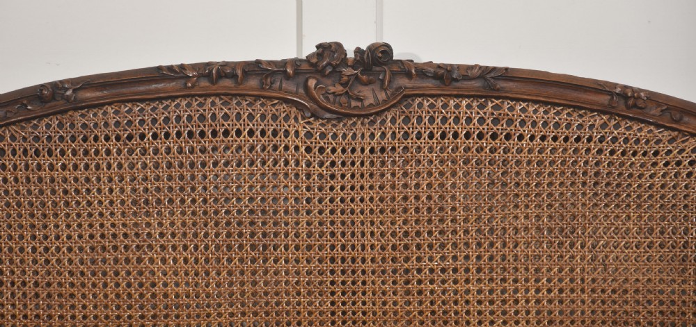  Louis XV–Style Carved Walnut Caned Settee View III