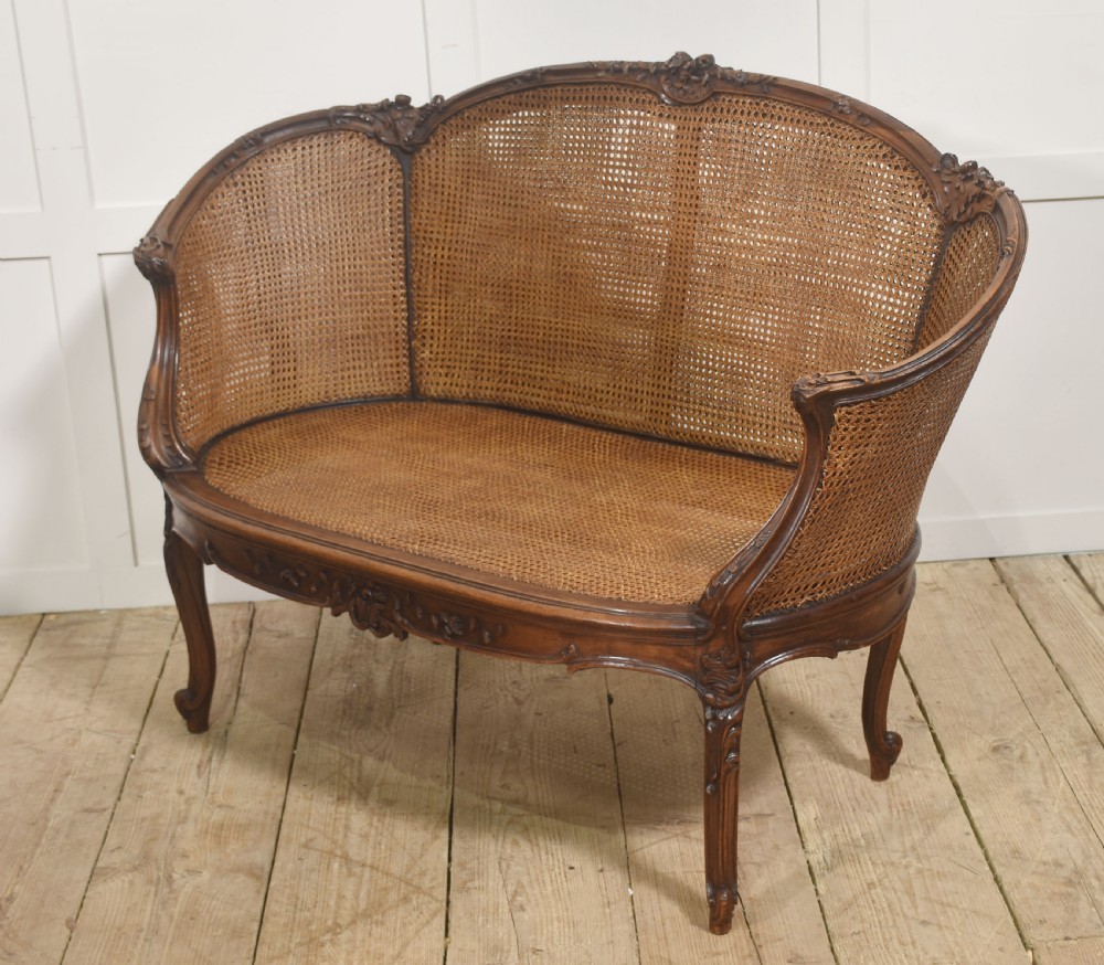  Louis XV–Style Carved Walnut Caned Settee View IX