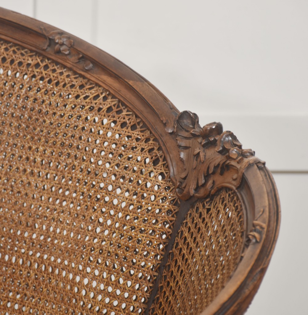  Louis XV–Style Carved Walnut Caned Settee View XII