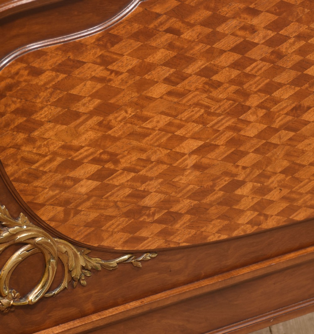 A Louis XVI style mahogany double bed frame featuring decorative parquetry veneer panels and polished gilt bronze mounts. View XIII