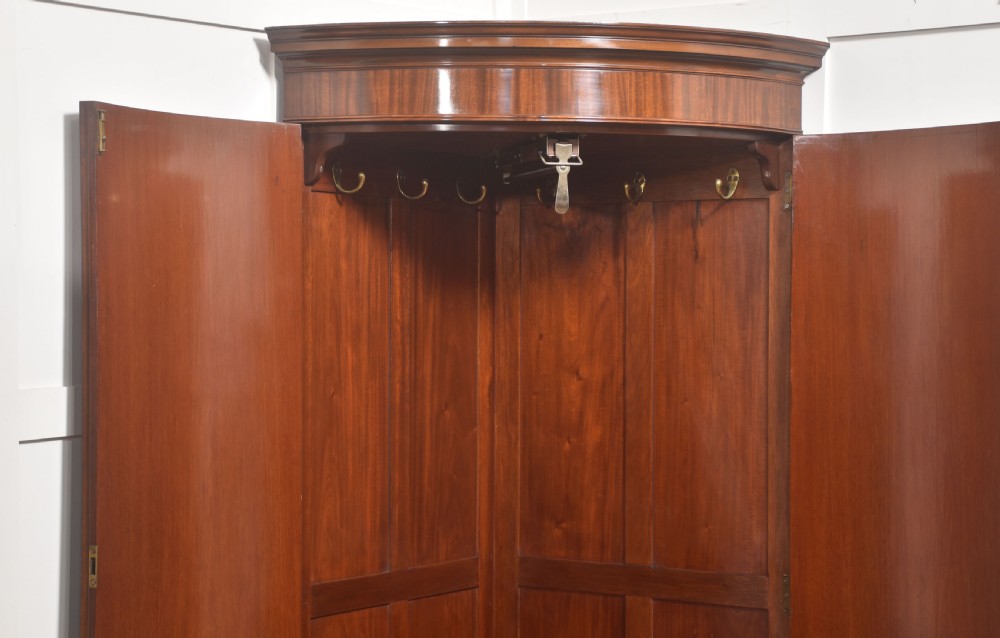 Early 20th Century Figured Mahogany Bowfront Corner Wardrobe View VIII