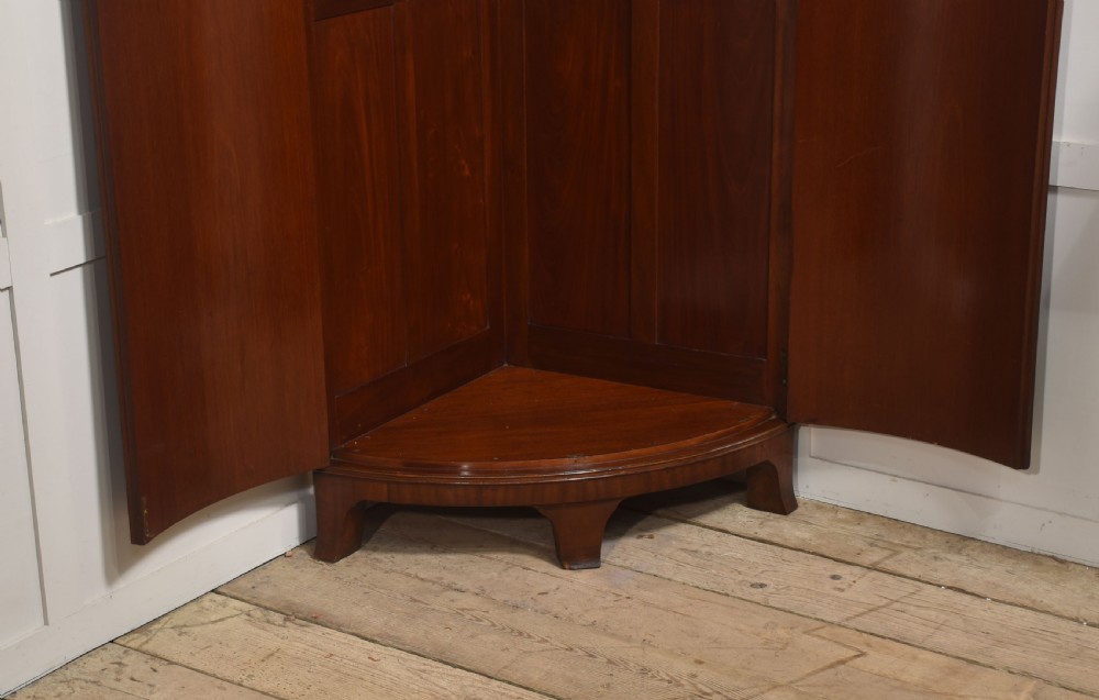 Early 20th Century Figured Mahogany Bowfront Corner Wardrobe View IX