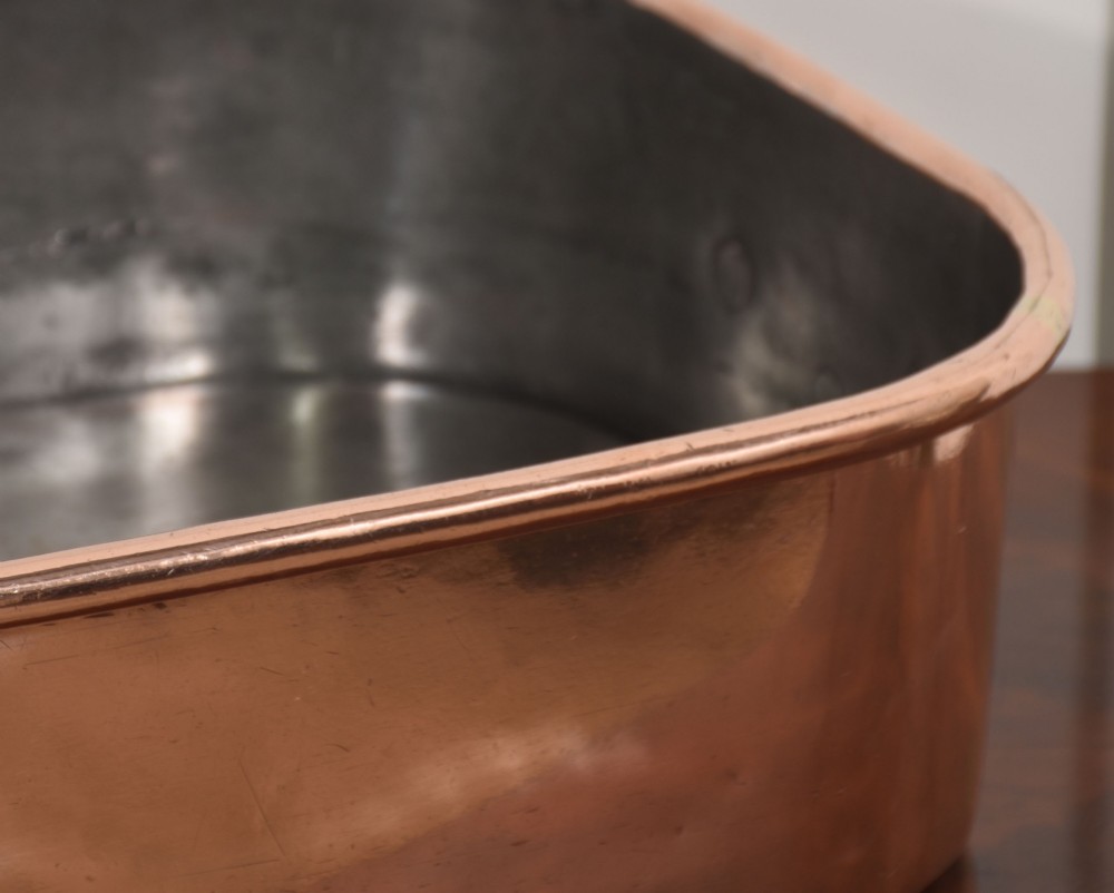 A deep rectangular antique copper fish kettle featuring heavy riveted brass drop handles and a tin-lined interior. View IV