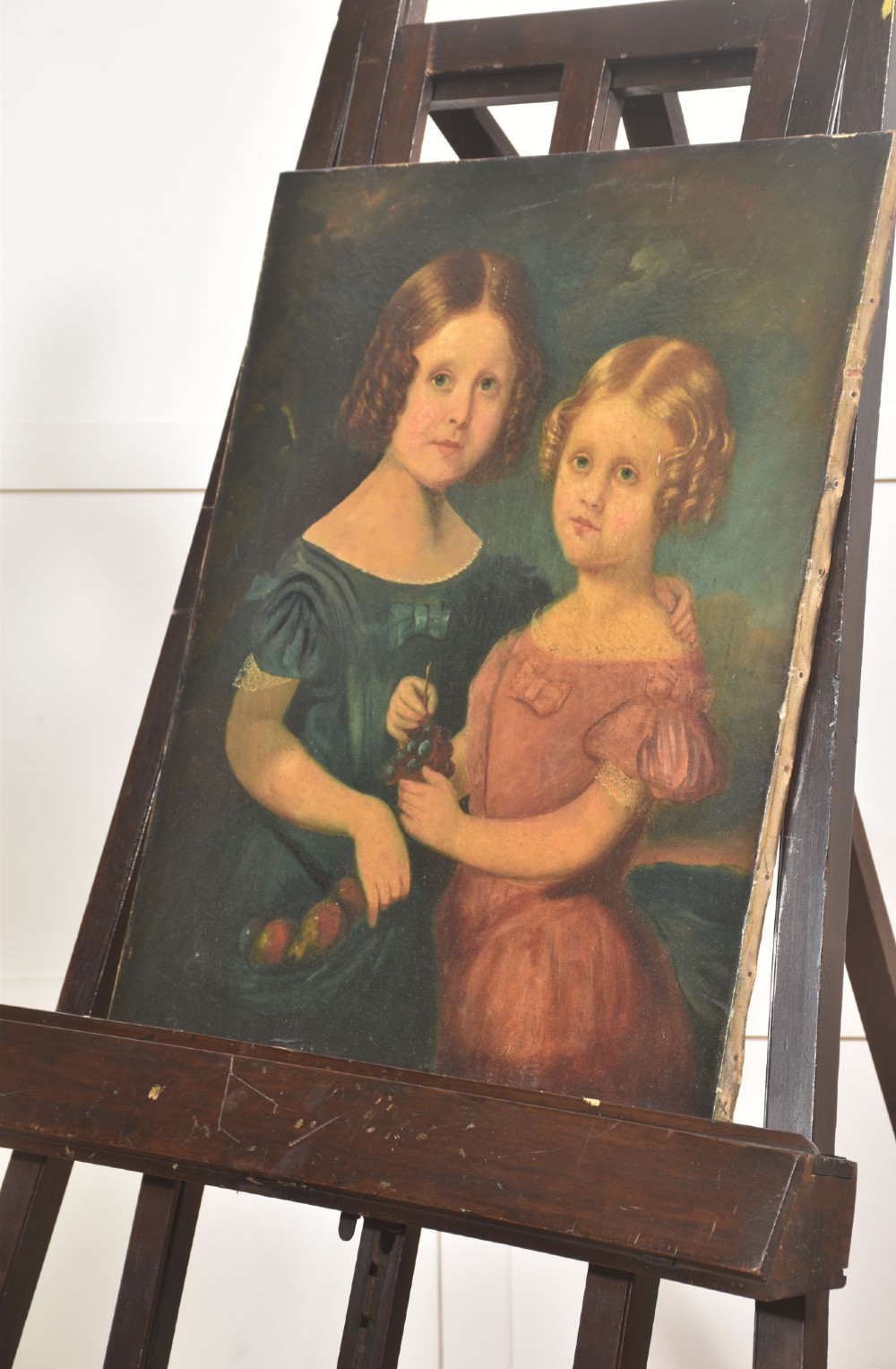 A large 19th-century mahogany floor-standing studio easel with a central adjustable shelf and an A-frame structure. View III
