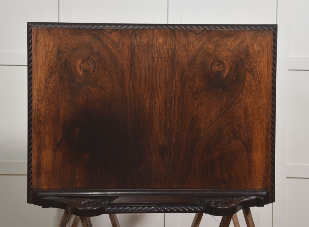 A 19th-century dark rosewood chest on stand with four drawers, pierced brass drop handles, barley twist side columns, and turned legs. View XI