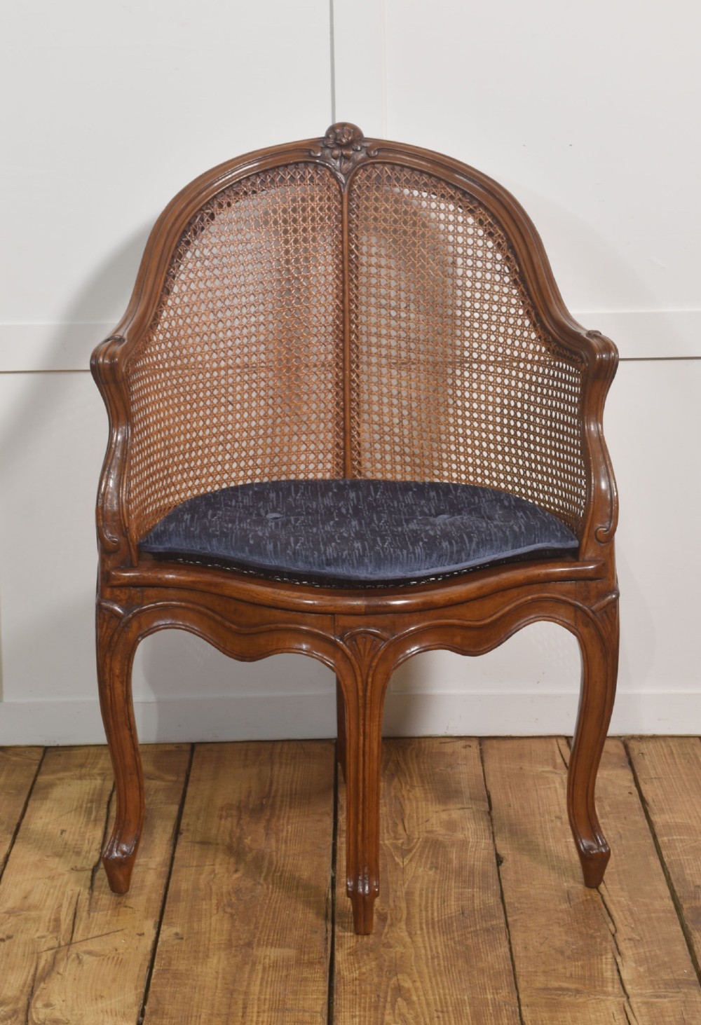 19th Century French Louis XV Style Walnut And Cane Tub Chair
