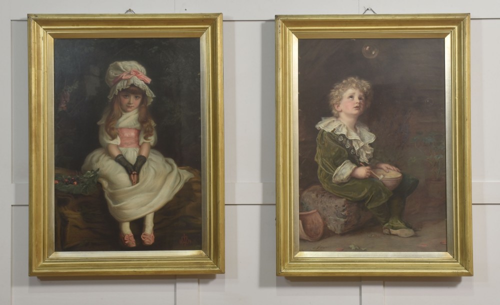 A pair of Victorian Pears Soap framed advertising prints depicting children in moulded gold giltwood frames.