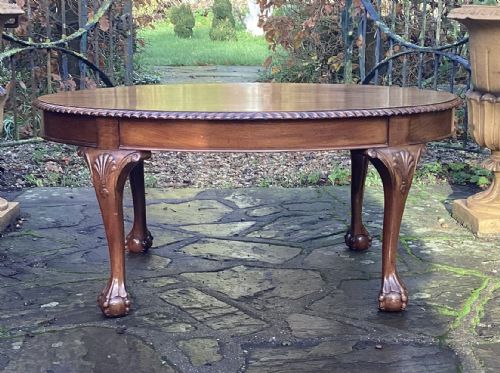 Good Mahogany Ball and Claw Oval Coffee Table