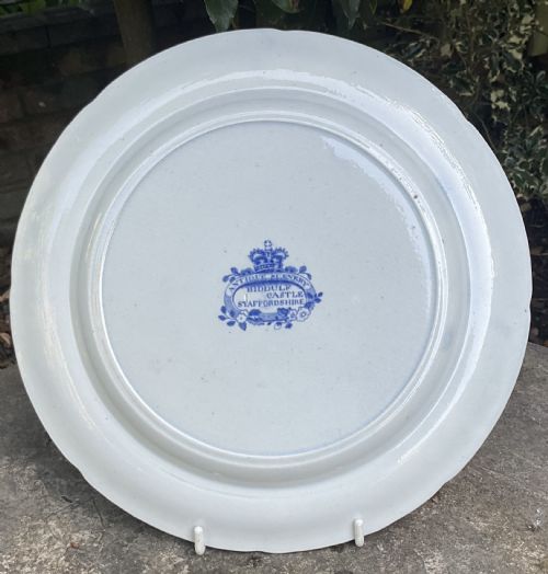 fig 2. A set of six circular Georgian blue and white transferware earthenware plates decorated with pastoral scenes, classical ruins, and intricate floral borders.