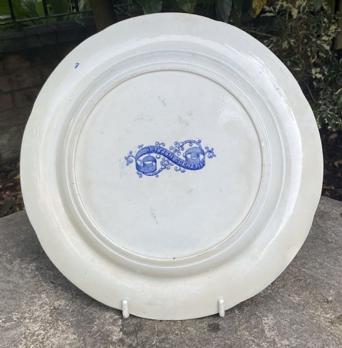 fig 3. A set of six circular Georgian blue and white transferware earthenware plates decorated with pastoral scenes, classical ruins, and intricate floral borders.