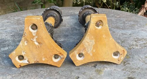 fig 2. A pair of Regency period candlesticks with yellow marble column stems, classical dark bronze sconces, acanthus collars, and bronze paw feet on triform marble bases.