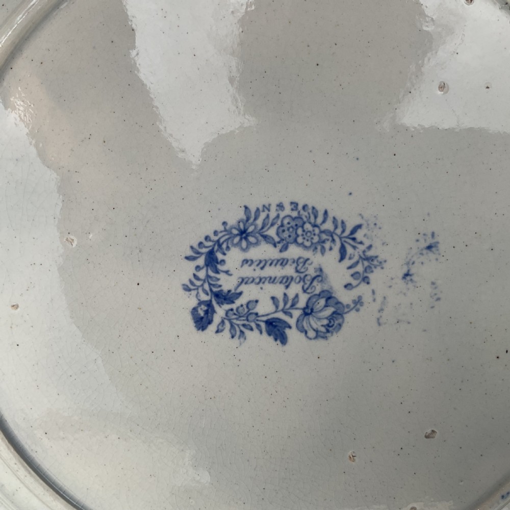 A set of six Victorian blue and white transferware earthenware plates decorated with a botanical floral centre and matching border. View IV
