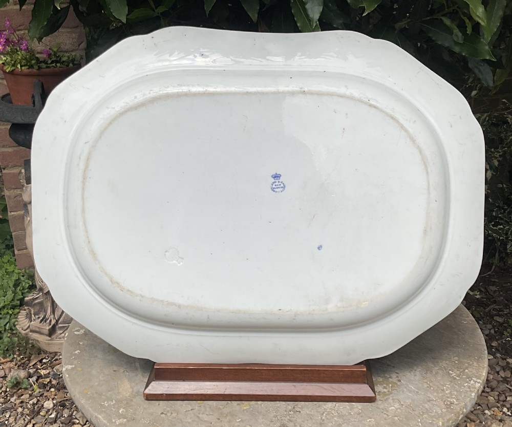An octagonal antique blue and white transfer-printed ceramic serving platter featuring a central bird motif and ornate floral borders. View III