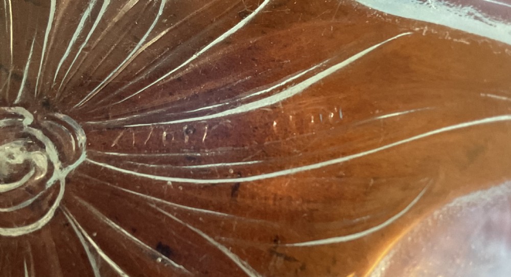 An Art Deco translucent opalescent glass bowl decorated with embossed motifs of birds in flight. View III
