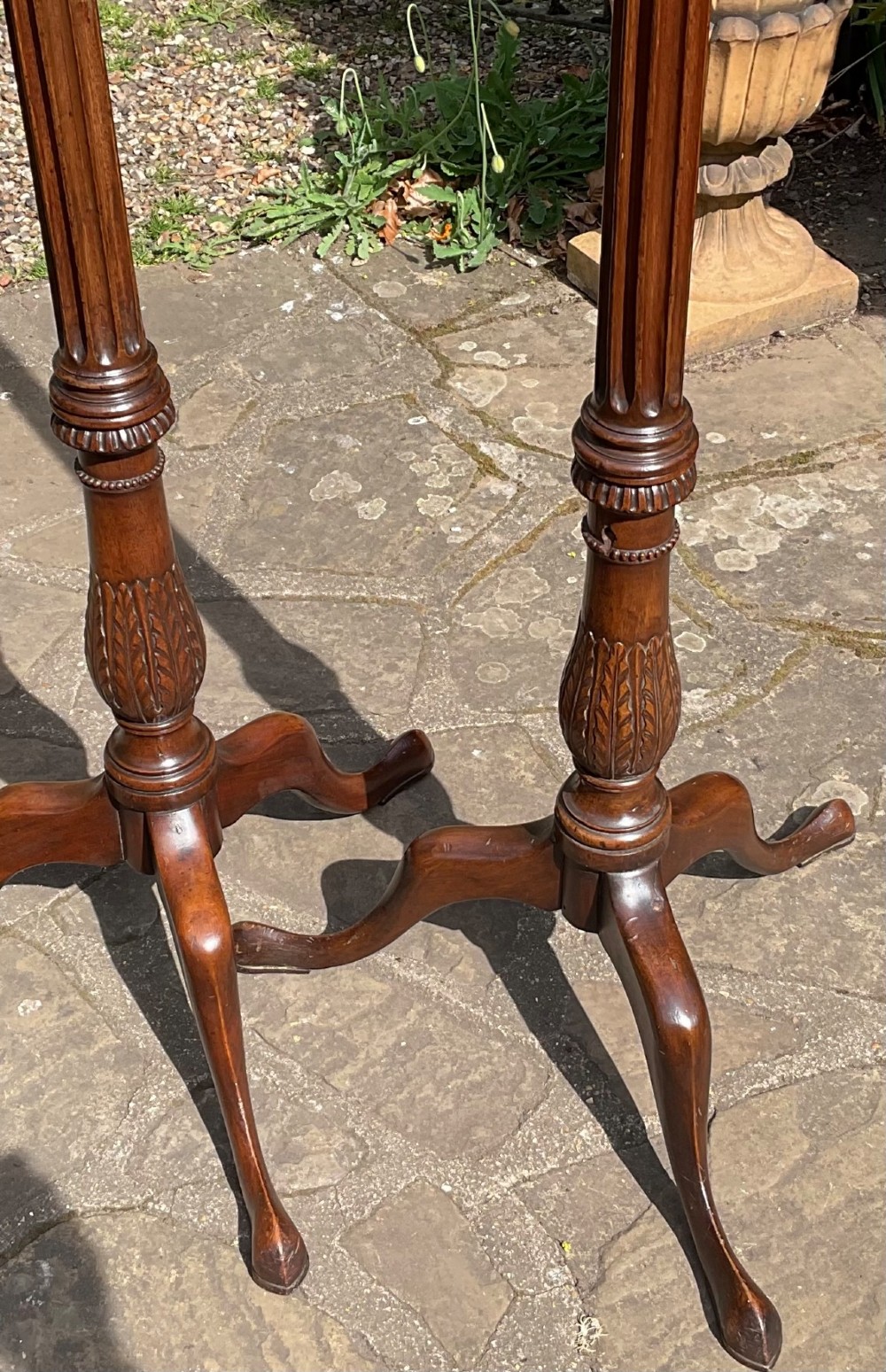 A pair of tall Georgian mahogany standard lamps featuring reeded columns, carved acanthus leaves, and tripod bases with cabriole legs. View III