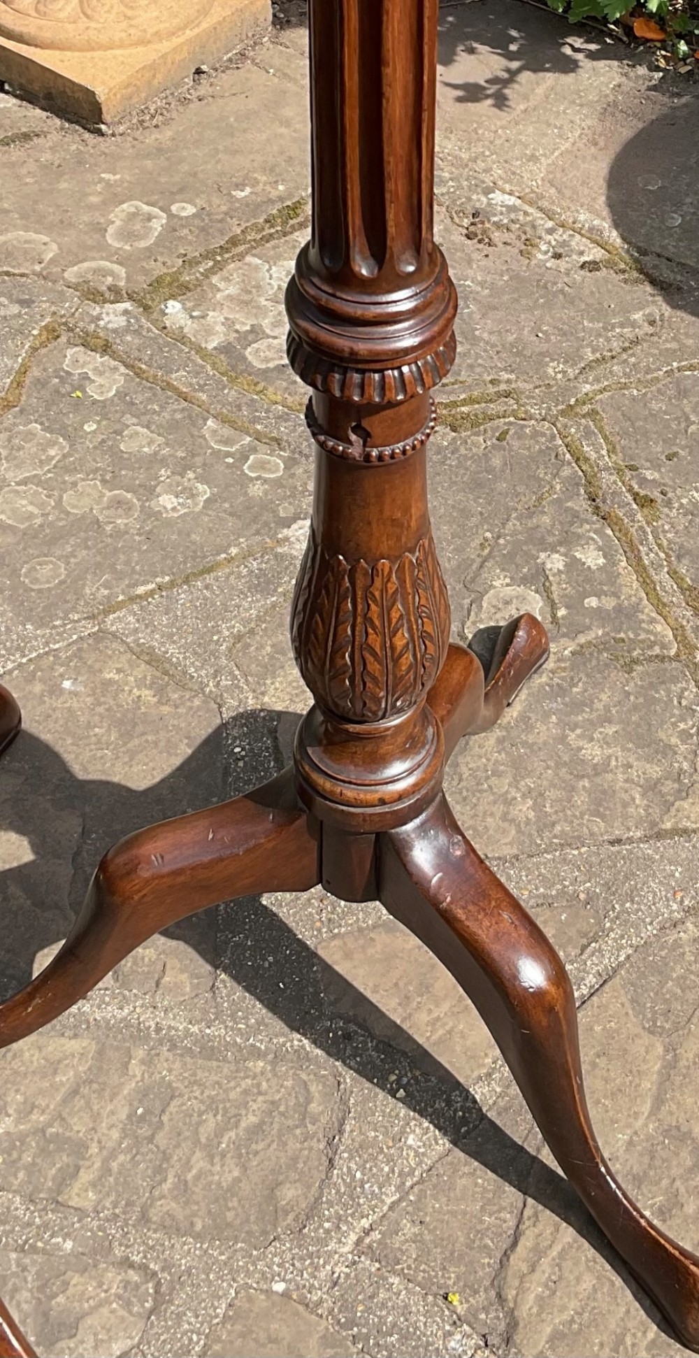 A pair of tall Georgian mahogany standard lamps featuring reeded columns, carved acanthus leaves, and tripod bases with cabriole legs. View IV