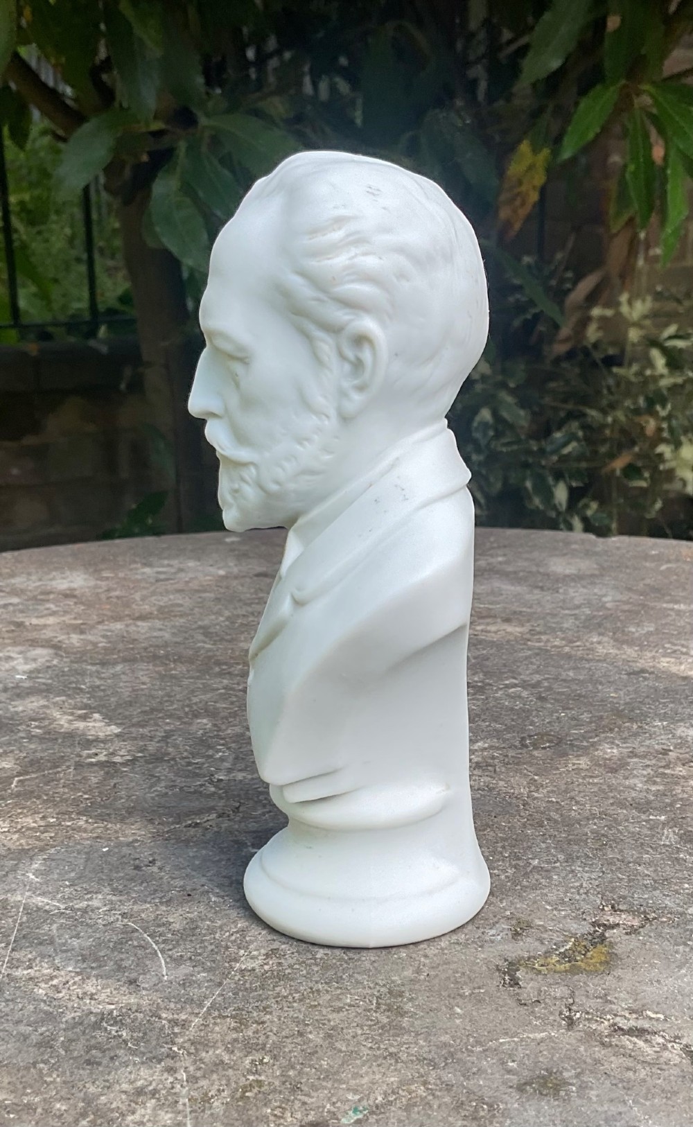 A white late Victorian Parian ware bust depicting the composer Tchaikovsky set on a turned socle base. View II