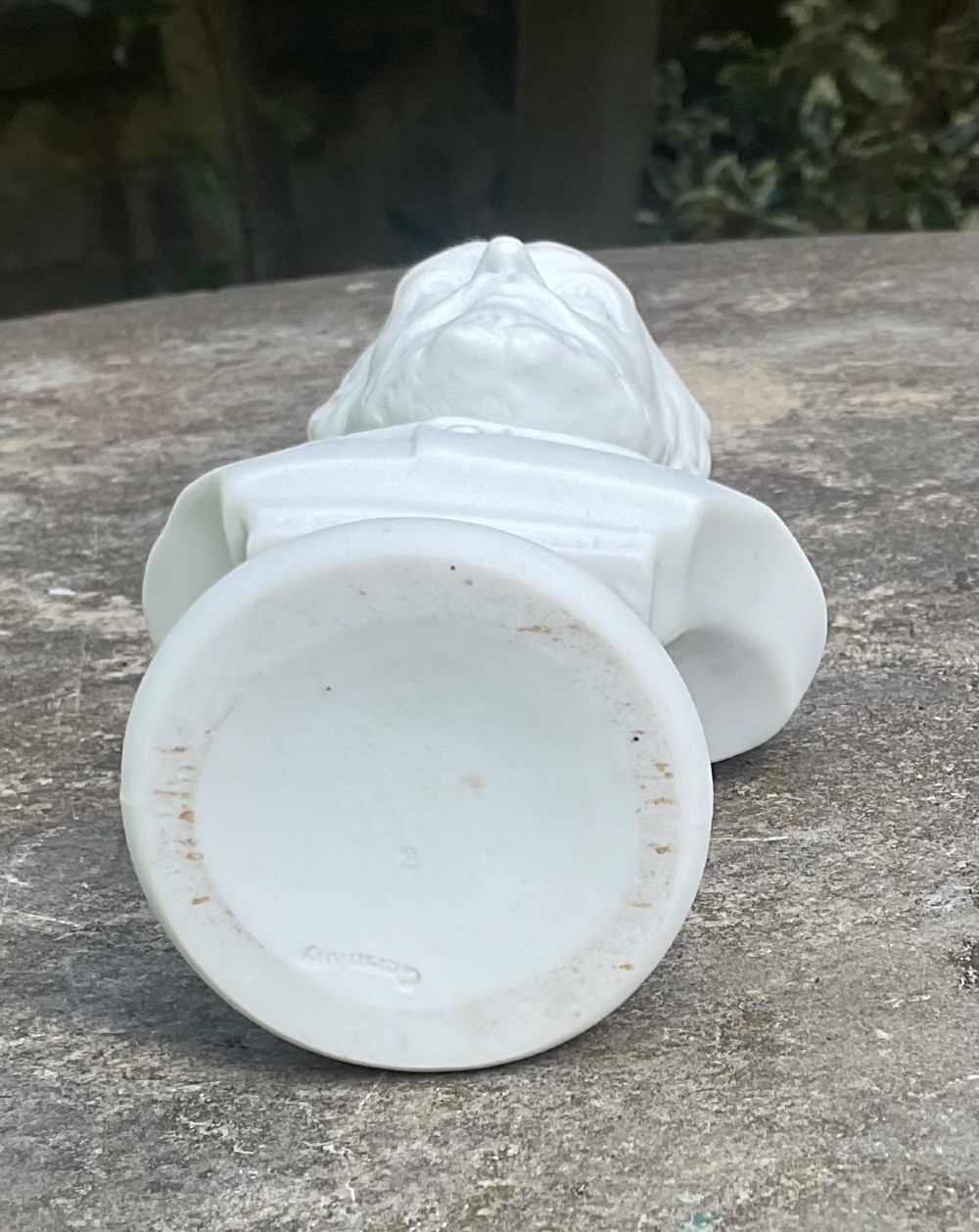 A white late Victorian Parian ware bust depicting the composer Tchaikovsky set on a turned socle base. View V
