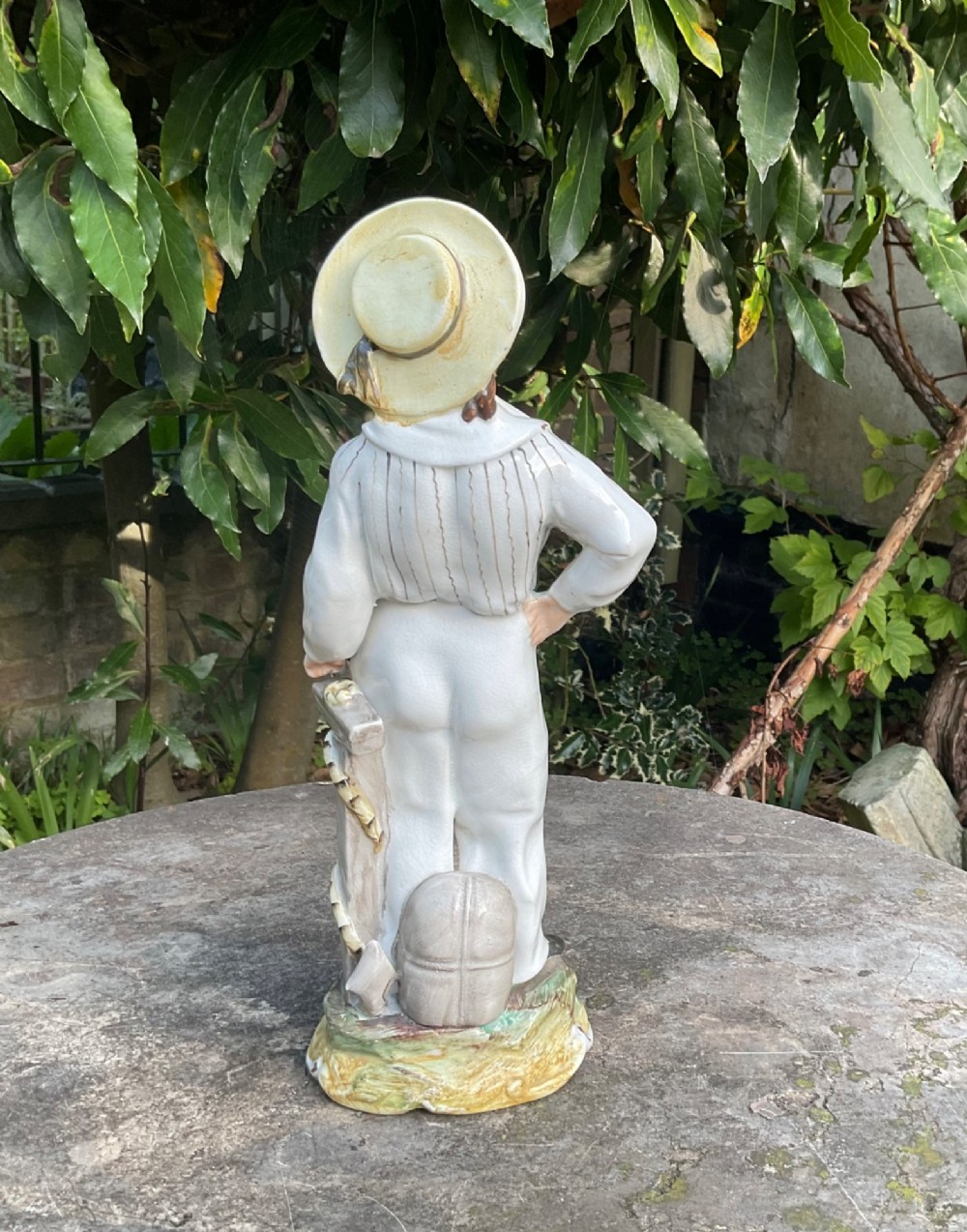 A Victorian Staffordshire earthenware figure depicting Prince Alfred in a sailor uniform on a polychrome moulded base. View III