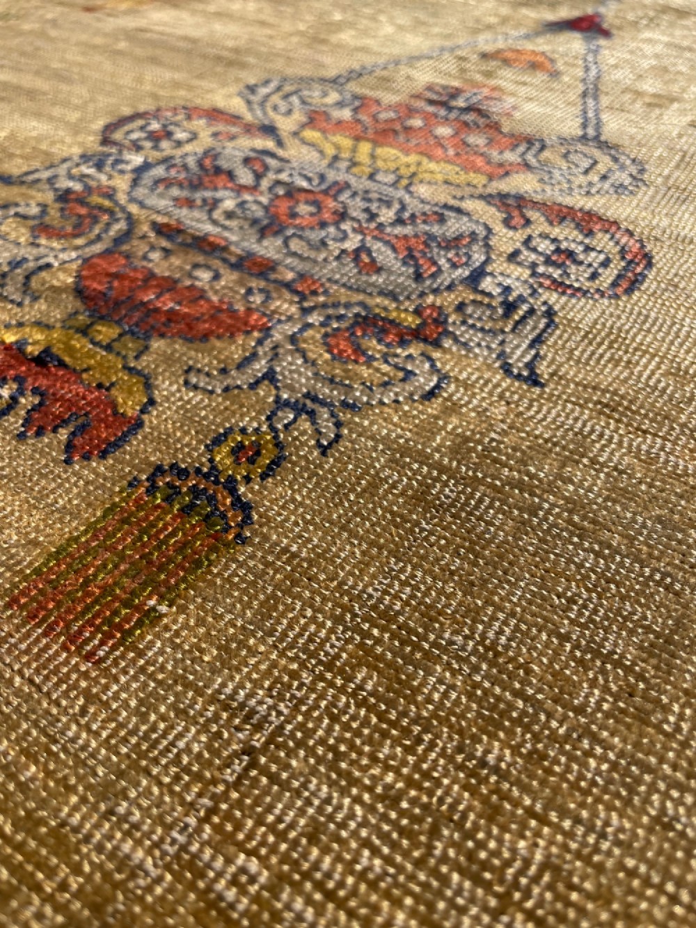 A 19th-century Anatolian silk prayer rug featuring a central gold niche with a hanging lamp motif, enclosed by navy blue and crimson floral borders. View III